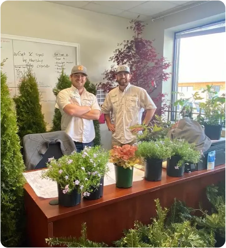 Southern Cut designers reviewing a landscape master plan and 3D rendering